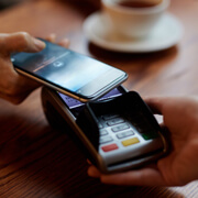 <h6>Mobile PoS</h6>  <p>Converts the merchant's smart phone into a portable point of sale, enabling merchants to accept payments anywhere in any currency.</p>